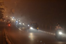 Smoke covers Pontianak in West Kalimantan on the evening of Aug. 23, 2015. The smoke came from a forest fire that had been burning for two weeks.