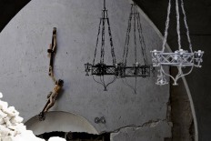 A broken crucifix hangs inside the damaged church of Santa Maria della Misericordia in Accumoli, central Italy, Wednesday, Aug. 24, 2016, after a magnitude 6 quake struck at 3:36 a.m. [0136 GMT] and was felt across a broad swath of central Italy, including Rome where residents of the capital felt a long swaying followed by aftershocks. AP Photo/Andrew Medichini

