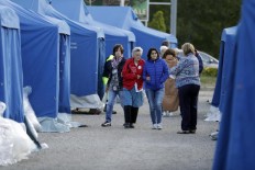 Italian officials say quake death toll hits 247 