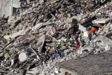 Aftershocks rattle Italian quake zone; toll rises to 250