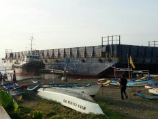 Two coal barges beached in Cilacap 