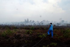 Fighting fires and haze in Indonesia