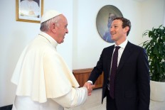 Pope Francis chats in person with Facebook CEO Zuckerberg 