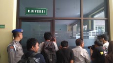 Makassar teacher, student settle matter out of court