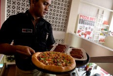 Pizza Hut franchisee books solid profit growth, eyes eastern expansion