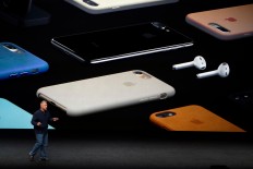 Apple says it needs more time before new ear buds are ready 