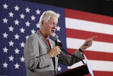 With his wife sidelined, Bill Clinton steps in to fill void 