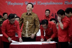 In latest survey, Ahok still leading, but insecure