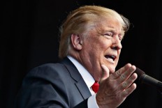 After testy VP debate, Trump rebuffs claim he 'loves' Putin 