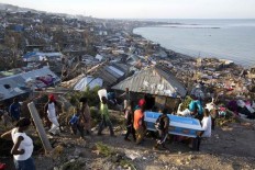 Haiti mourns as families bury loved ones killed by hurricane