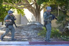 Police chief: 2 officers killed, 1 hurt; shooter at large