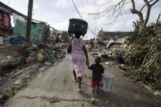 Haitians worship among devastation caused by hurricane 