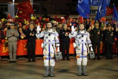 China launches crewed mission to dock with space station 