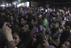 Grief after Thai king's death spills into anger