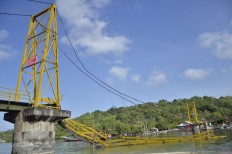 Search around collapsed bridge in Bali called off