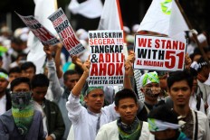 Hotdogs, blasphemy, bigotry, Jakarta elections and Ahok