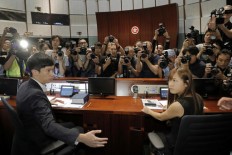 Hong Kong lawmakers lose legal battle over oaths 