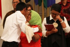 Returning home feels like a dream for four freed hostages 