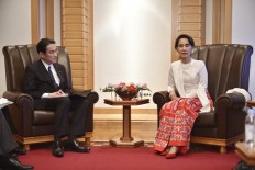 Suu Kyi says Myanmar dealing with Rakhine under rule of law 