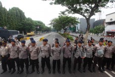 Jokowi leaves Palace as anti-Ahok rally kicks off