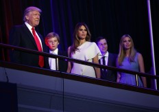 Late-night hosts mark Trump's election with jokes, therapy 