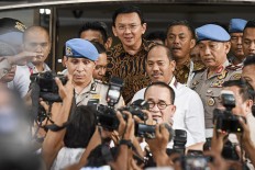 Ahok’s lawyer satisfied with case screening
