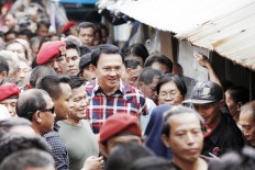 Ahok's suspect status: A short-term solution?
