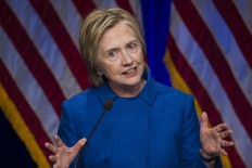 Clinton reflects on loss, urges backers to 'stay engaged' 