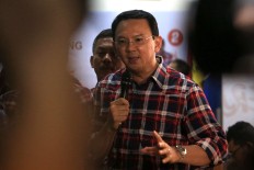 Ahok to present more evidence, witnesses at Tuesday’s questioning