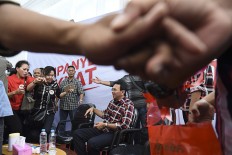 Police communicate with prosecutors to speed up Ahok's legal process