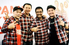  Ahok cancels campaign event during Monas rally