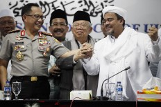 West Java Police question FPI leader over alleged insult to Pancasila