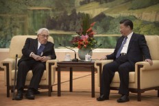 Xi tells Kissinger China wants 'stable' progress with US 