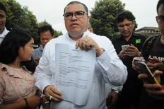 Singer Ahmad Dhani, activists declared treason suspects 