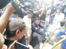 Agus promises to solve Jakarta flood problem