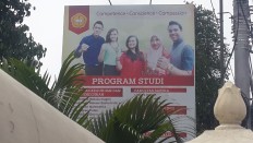 Catholic university refuses to remove billboards with hijab-clad student