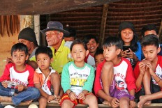 Up close: Old and young people gather together in a village in Toraja. JP/ PJ Leo