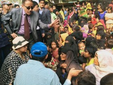 Indonesia widens arms for refugees