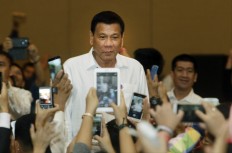 How the Philippines' incomplete 'People Power' revolution paved the way for Rodr...