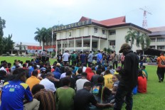 Detainment of four Papuan students for alleged treason extended