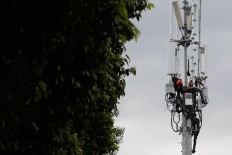  XL Axiata sales towers to improve efficiency, reduce costs