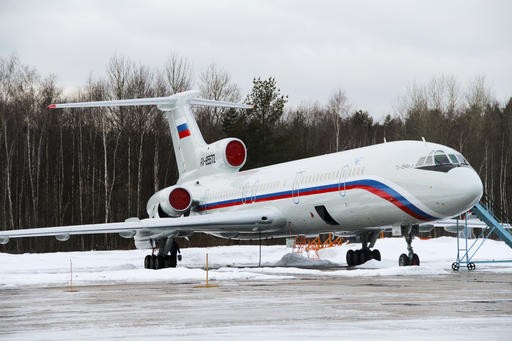 This photo taken on Jan. 15, 2015 shows the Tu-154 plane with registration number RA-85572 at Chkalovsky military airport near Moscow, Russia. A Russian plane with 93 people aboard, including a well-known military band, crashed into the Black Sea on its way to Syria on Sunday, Dec. 25, 2016, minutes after takeoff from the resort city of Sochi, the Defense Ministry said. The Tu-154, the same plane shown in this photo, which belonged to the Defense Ministry, was taking the Alexandrov Ensemble to a concert at the Russian air base in Syria.
