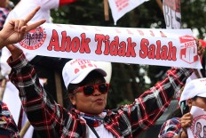 Ahok slams acting governor for promoting demoted officials