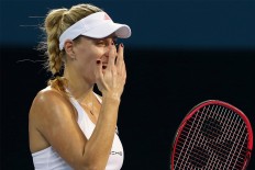 Top-ranked Kerber loses her opening match in Sydney 
