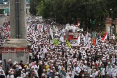 Police investigate possible insult to state symbol during FPI rally