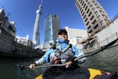 Getting a different view of Tokyo by kayak