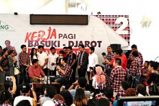 Ahok to build apartments for young couples if elected