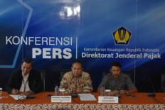 Tax office seizes assets in money laundering case