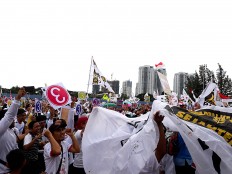 Anies' volunteers beef up campaign, convoying in Jakarta's five municipalities