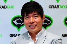 Toyota invests in Uber rival Grab 